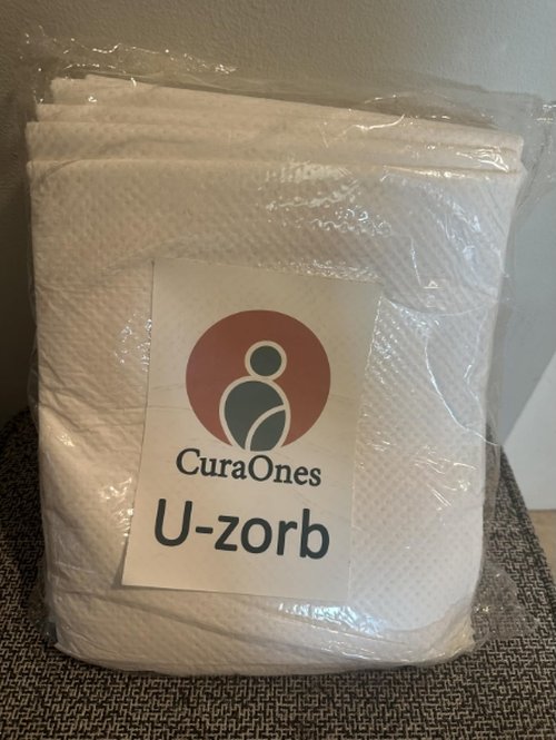 Customer photo of a packaged CuraOnes U-Zorb pad