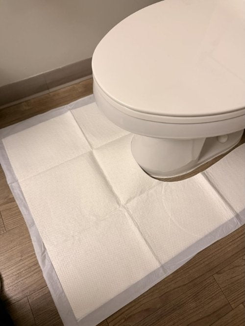 Customer photo of a U-Zorb pad fitted around a toilet