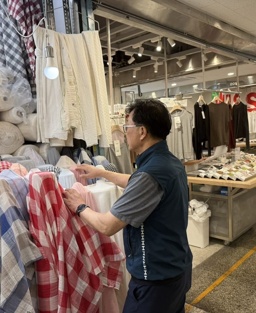 Sourcing fabric at a market in Seoul
