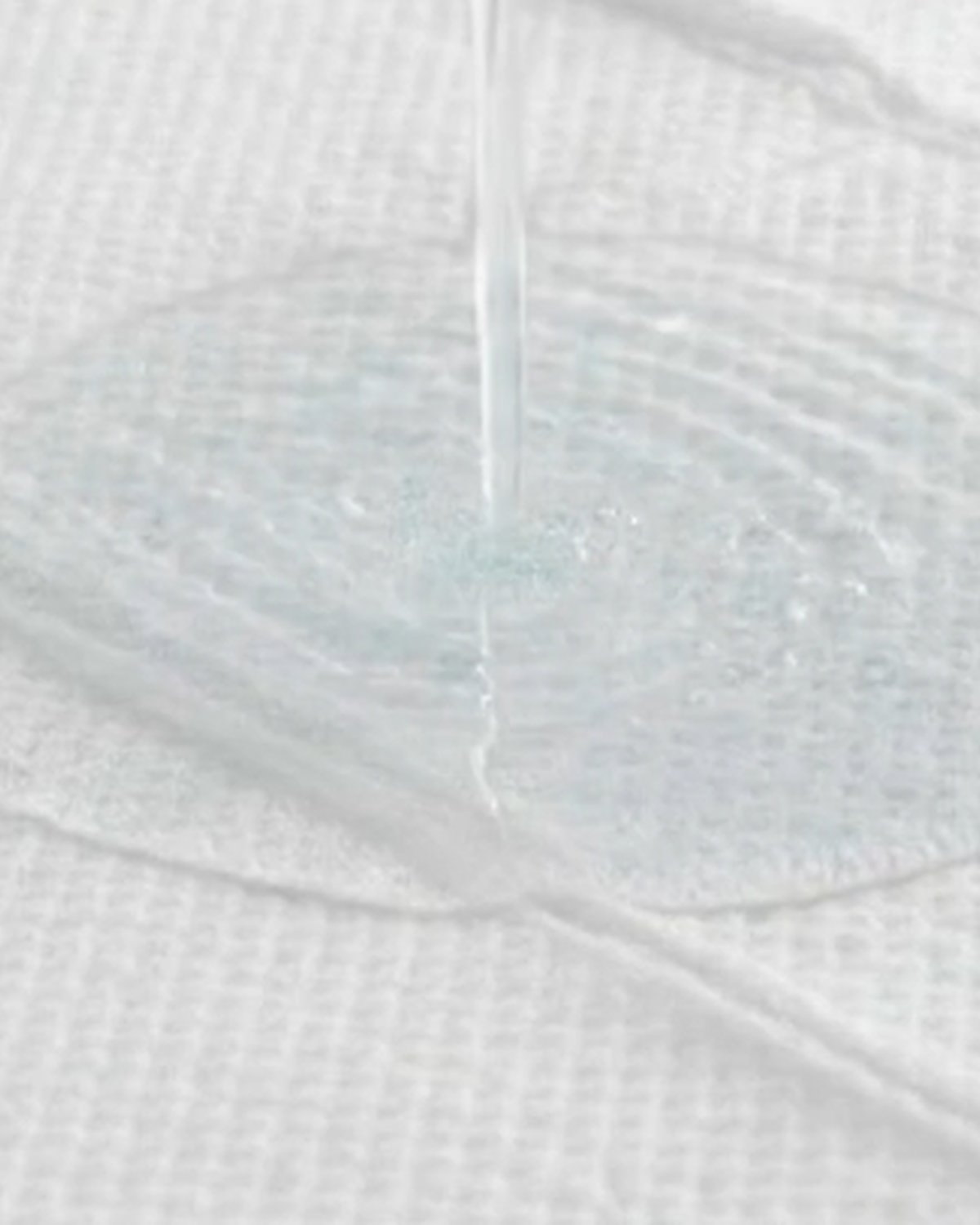 Liquid fully absorbed into the U-Zorb pad, leaving the floor dry